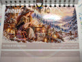 Mystical Witch calendar front cover with a witch, black cat and woodland scenery